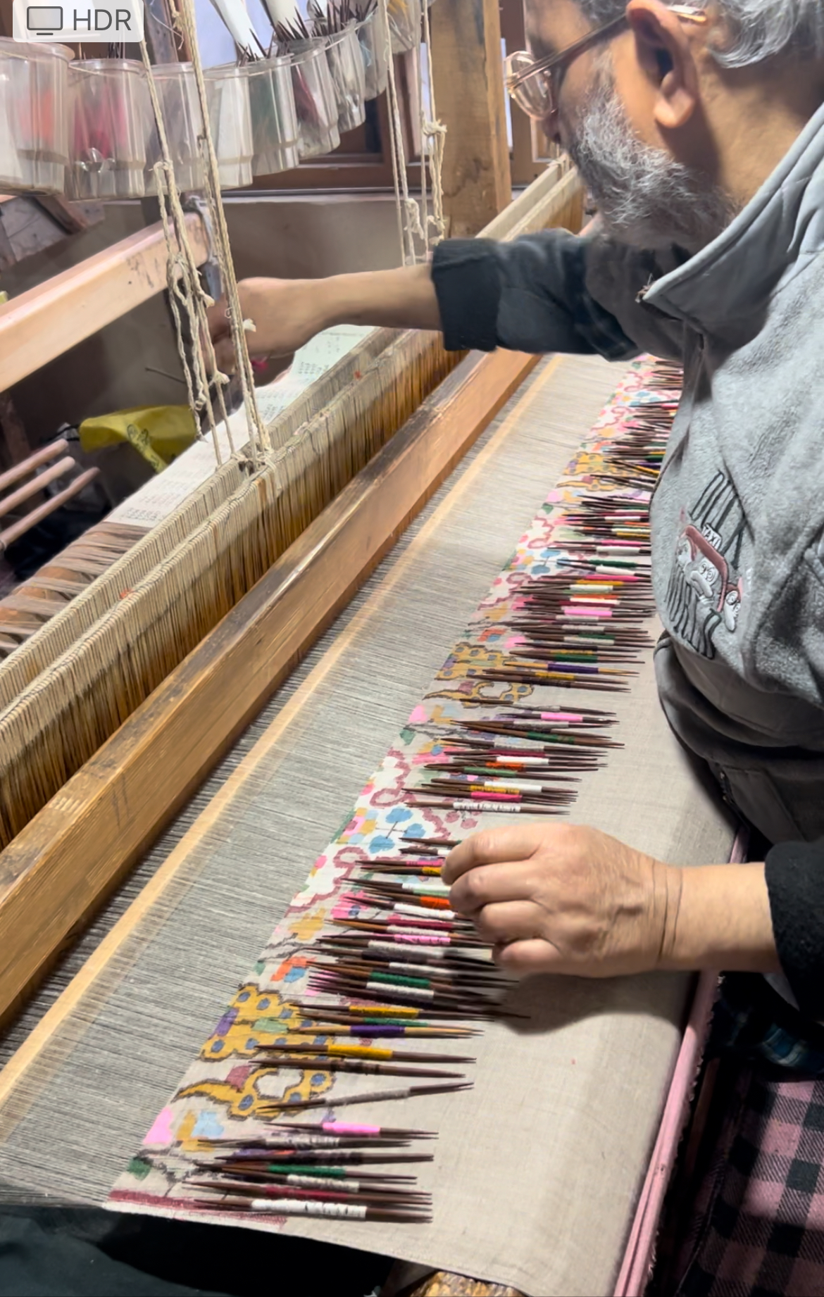 Kani loom with wooden bobbins